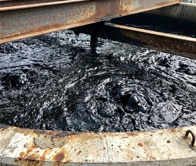 Water and Sludge in waste oil